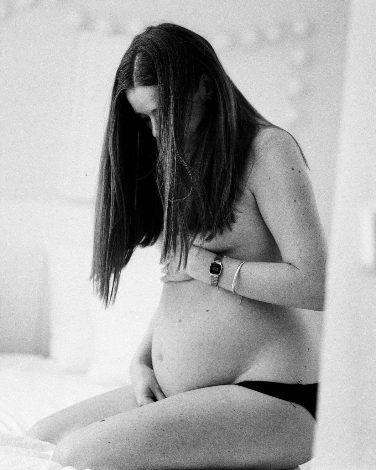https://www.cakematernity.com/wp-content/uploads/pregnant-woman-behind-curtain.jpg